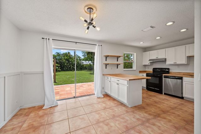 143 Bobwhite Road, Royal Palm Beach, FL 33411