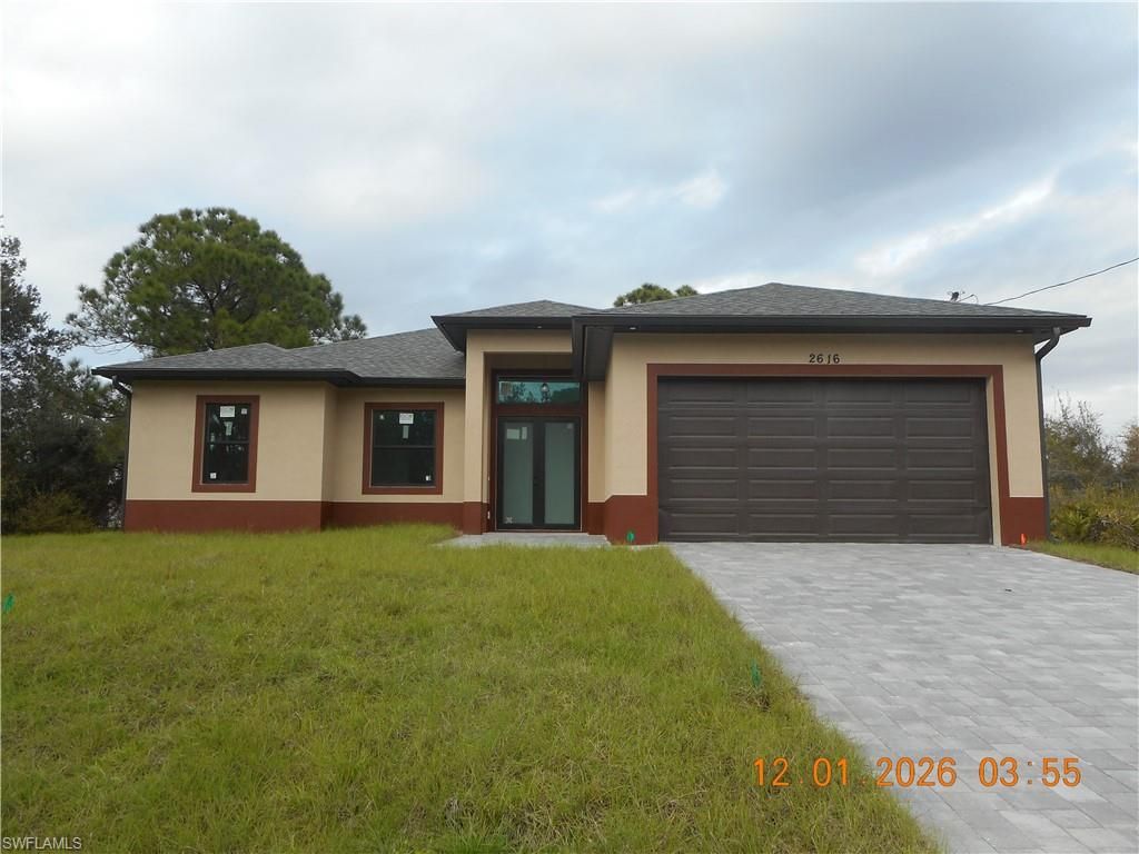 2616 38th ST W, LEHIGH ACRES, FL 33971 — exterior