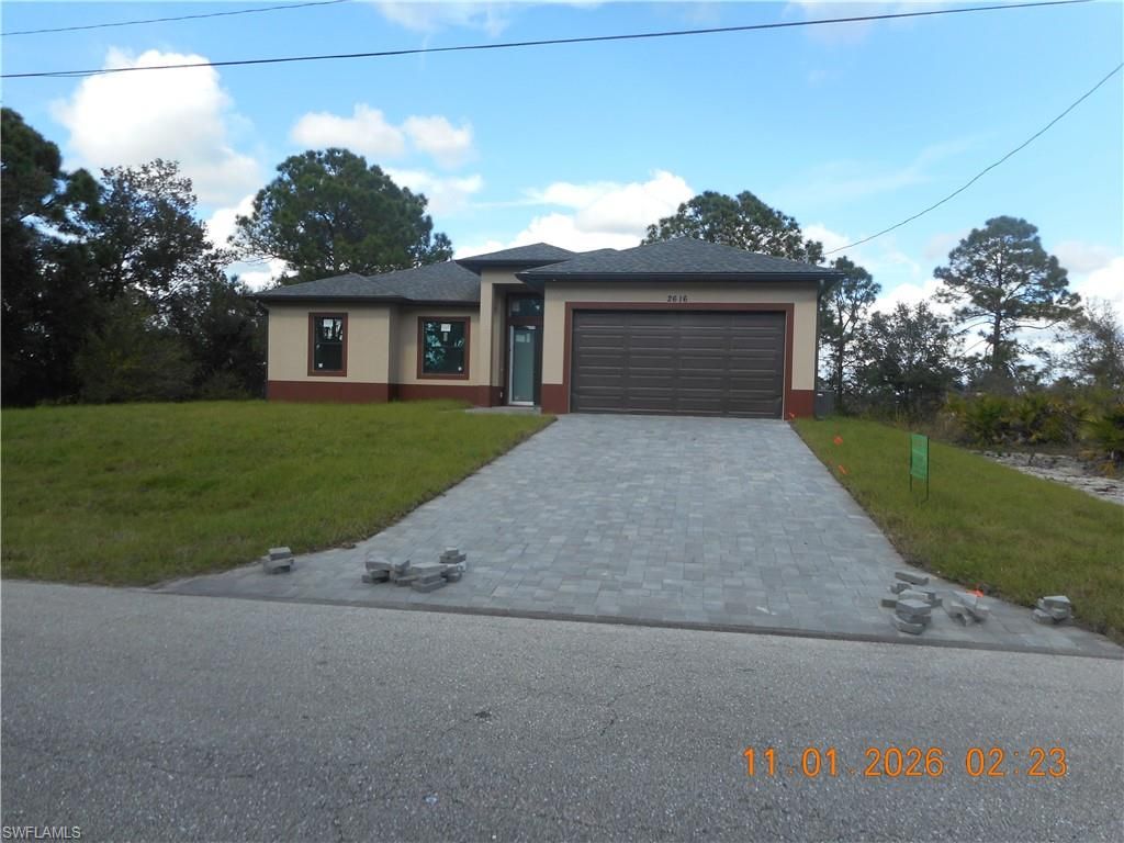 2616 38th ST W, LEHIGH ACRES, FL 33971 — photo 2