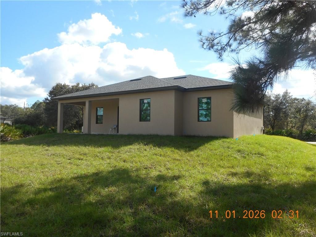2616 38th ST W, LEHIGH ACRES, FL 33971 — photo 4