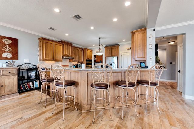 1522 Windsong Way, Tiki Island, TX 77554