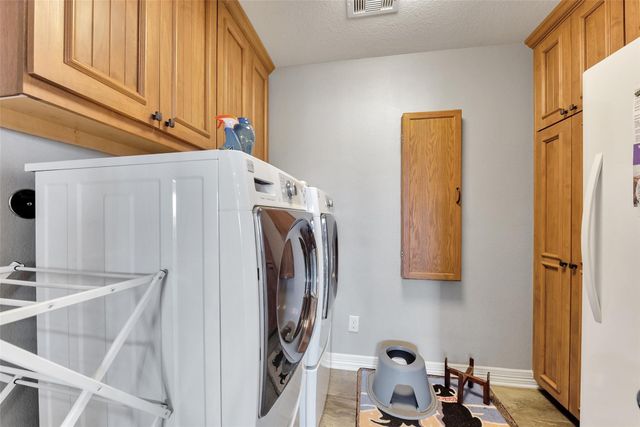 1522 Windsong Way, Tiki Island, TX 77554