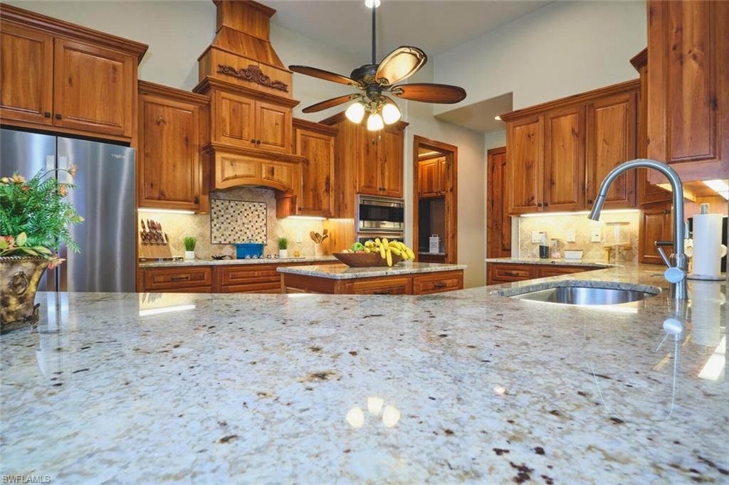 Image 9 of property listing at 5306 SW 27th PL, Cape Coral, FL 33914