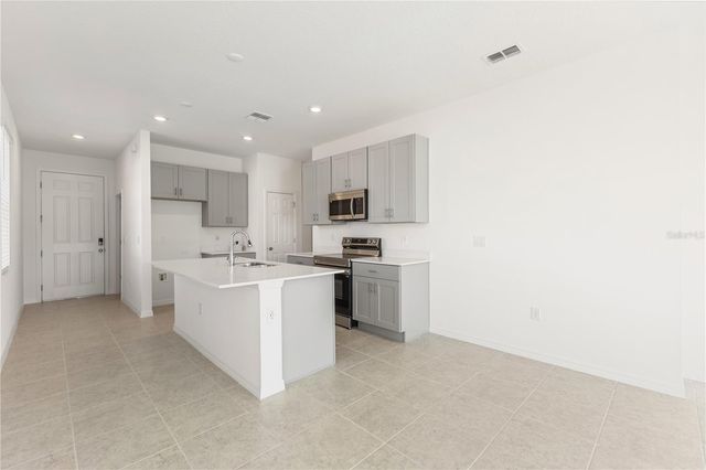 9116 WILDLIGHT TRAIL, Wildwood, FL 34785