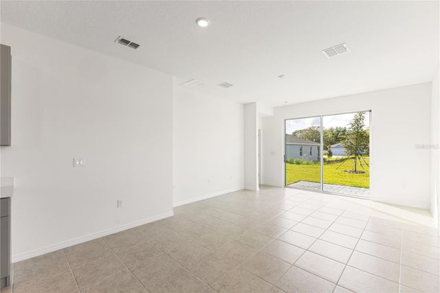 9116 WILDLIGHT TRAIL, Wildwood, FL 34785