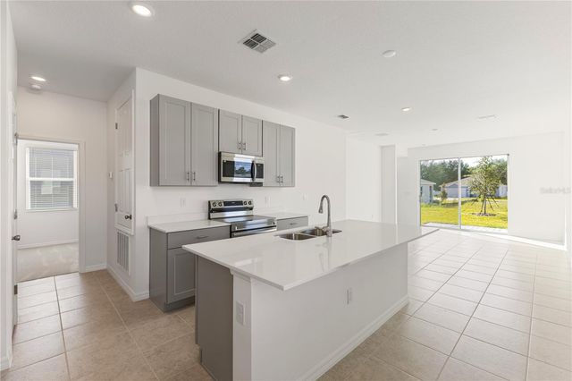 9116 WILDLIGHT TRAIL, Wildwood, FL 34785