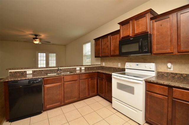 30902 W Lost Creek Boulevard, Magnolia, TX 77355