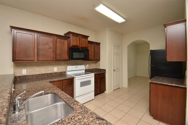 30902 W Lost Creek Boulevard, Magnolia, TX 77355