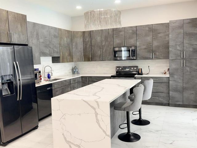 5989 NW 74th Street, Parkland, FL 33067