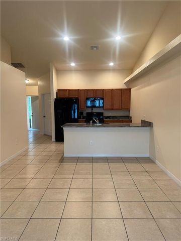 411 Nicholas PKWY W, Cape Coral, FL 33991
