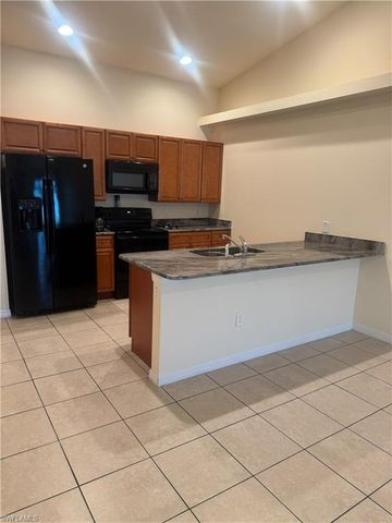 411 Nicholas PKWY W, Cape Coral, FL 33991