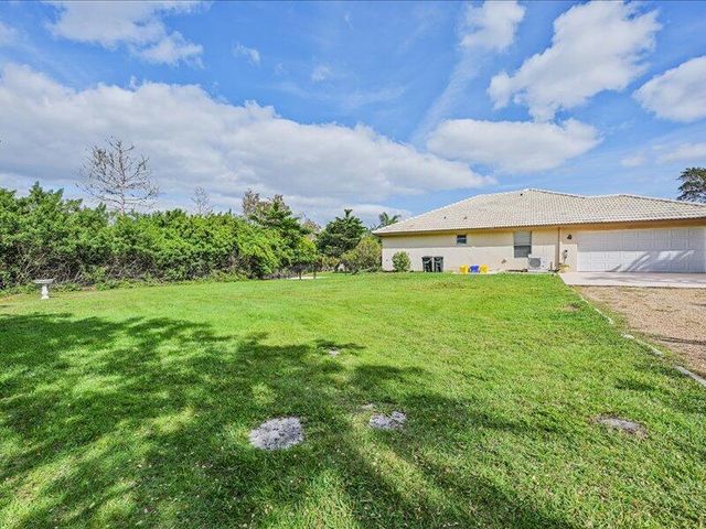 8671 155th Place N, Palm Beach Gardens, FL 33418