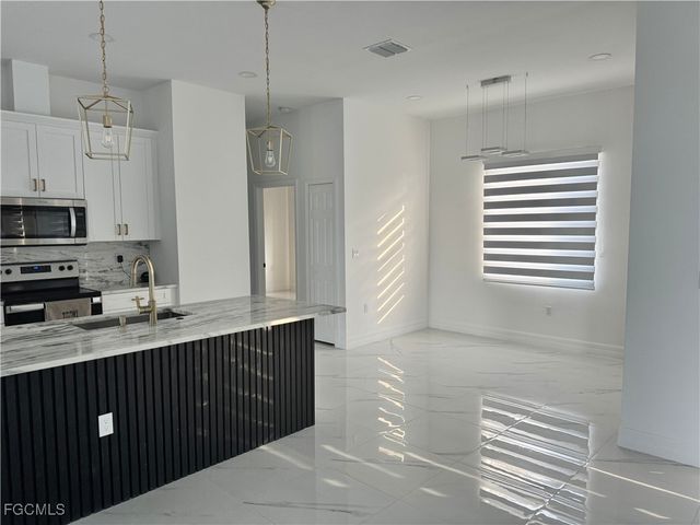 1907 W 9th ST, Lehigh Acres, FL 33972