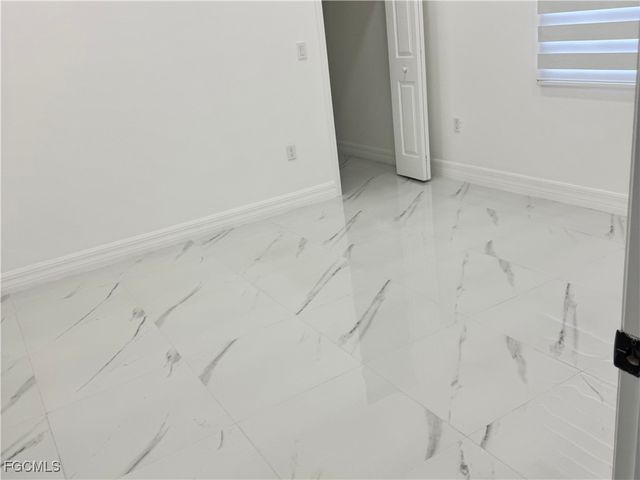 1907 W 9th ST, Lehigh Acres, FL 33972