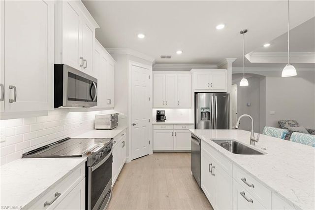 387 Grace Bay LN, Naples, FL 34114