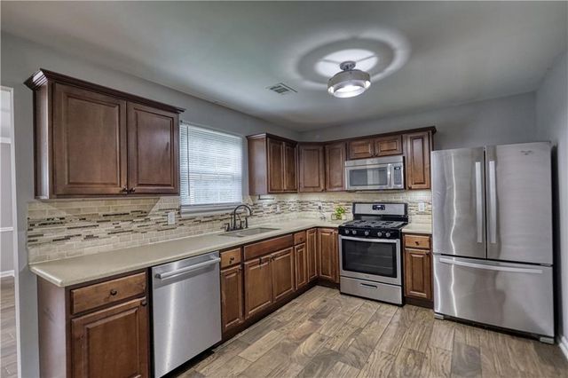 123 The Esplanade Way, Loganville, GA 30052