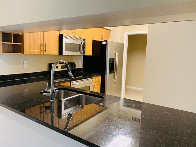 6521 Emerald Dunes Drive 307, West Palm Beach, FL 33411