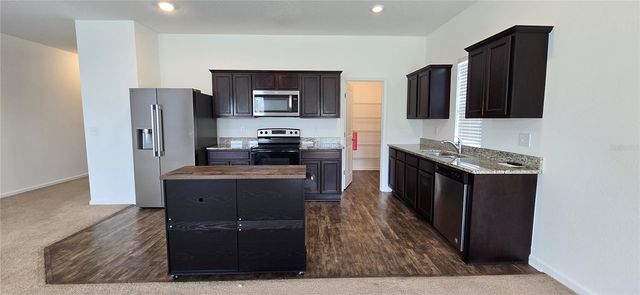 15660 MERLIN AVENUE, Mascotte, FL 34753
