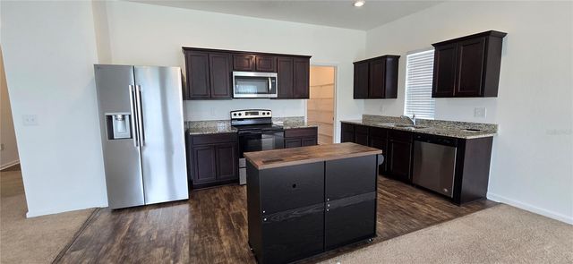 15660 MERLIN AVENUE, Mascotte, FL 34753
