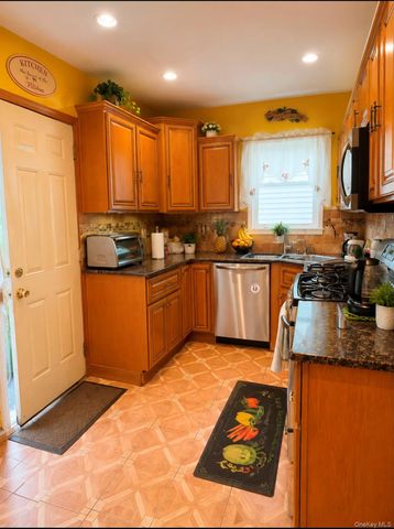 77-06 97th Avenue, Ozone Park, NY 11416