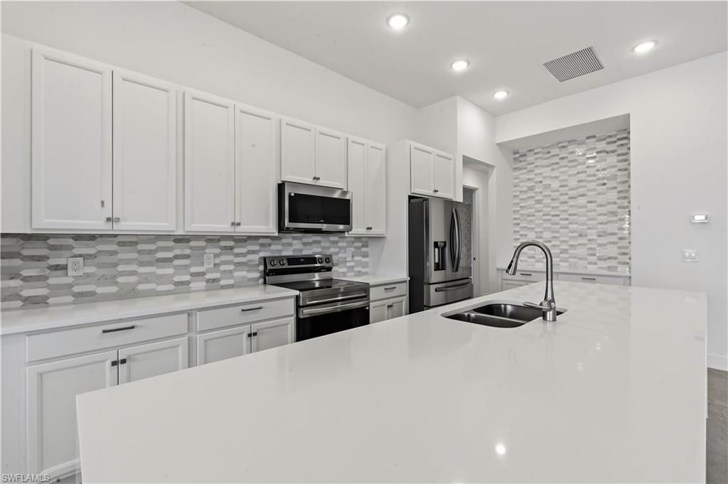 1241 33RD AVE, CAPE CORAL, FL 33993 — photo 3