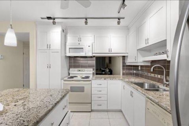 6095 N Sabal Palm Blvd 210, Tamarac, FL 33319