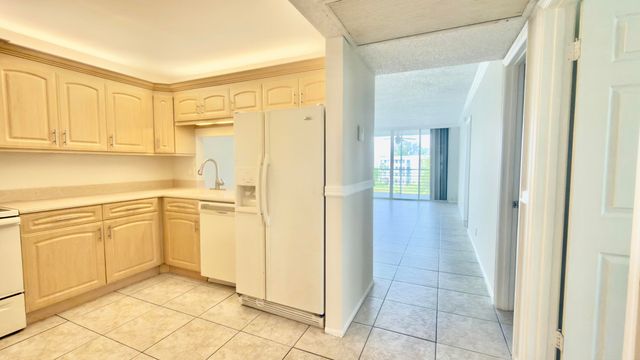 9311 ORANGE GROVE Drive 402, Davie, FL 33324