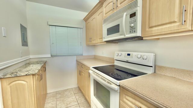 9311 ORANGE GROVE Drive 402, Davie, FL 33324