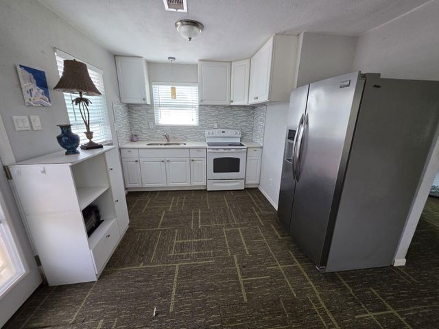 354 Sir Lancelot Drive N, Sargent, TX 77414
