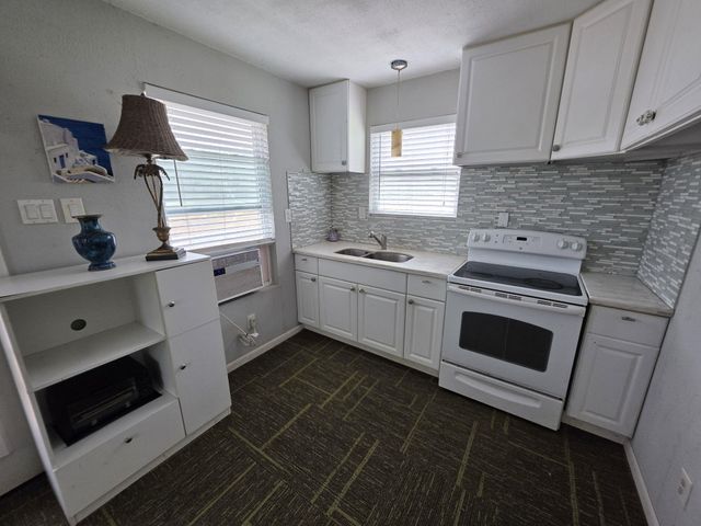 354 Sir Lancelot Drive N, Sargent, TX 77414
