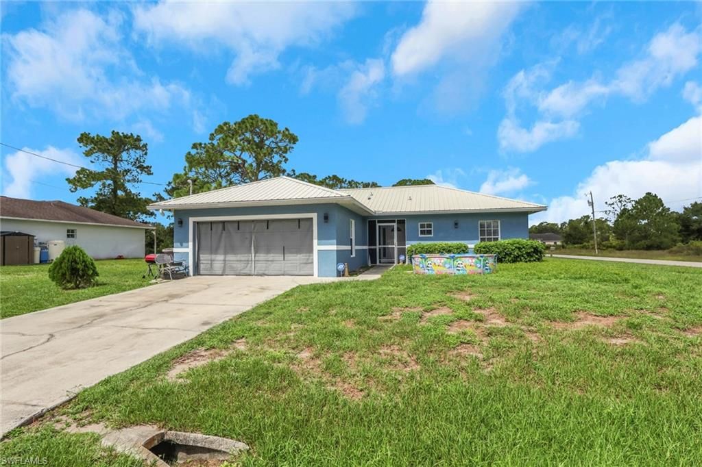 912 Mary AVE S, LEHIGH ACRES, FL 33974 — exterior