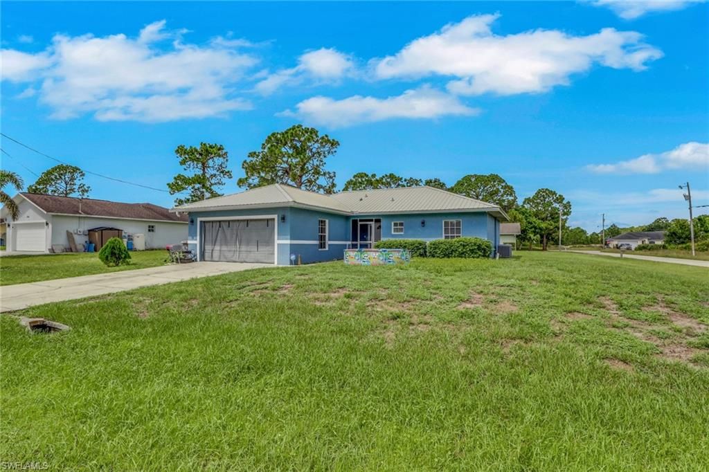 912 Mary AVE S, LEHIGH ACRES, FL 33974 — photo 2