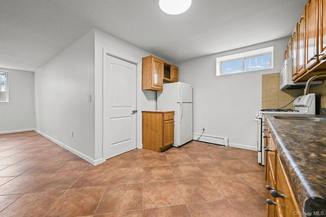 93-29 91st Avenue, Woodhaven, NY 11421