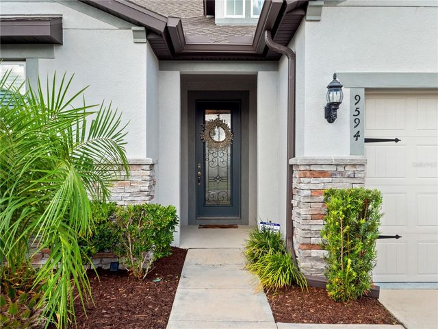 9594 RALLY SPRING LOOP, Wesley Chapel, FL 33545
