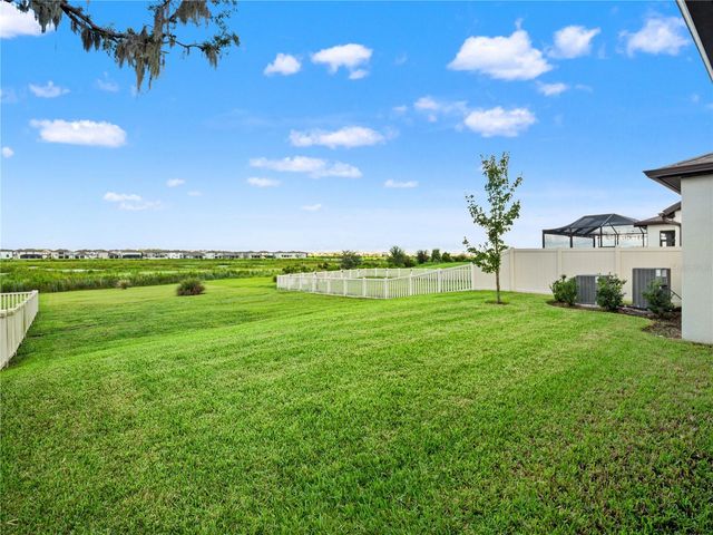 9594 RALLY SPRING LOOP, Wesley Chapel, FL 33545