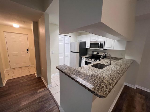 2802 SARENTO Place 302, Palm Beach Gardens, FL 33410