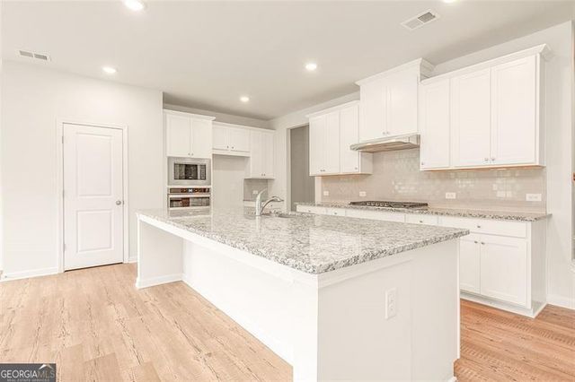 410 POINT PLACE Drive, Loganville, GA 30052