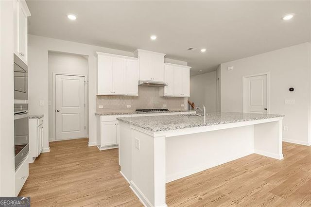 410 POINT PLACE Drive, Loganville, GA 30052