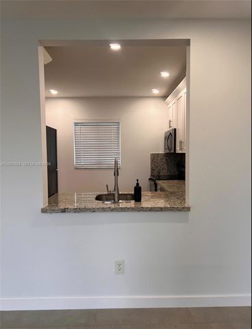 7732 Camino Real 402, Miami, FL 33143