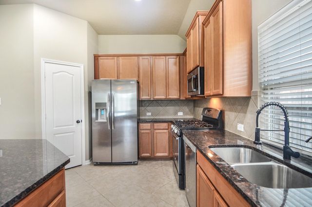 22714 Little Blue Stem Drive, Tomball, TX 77375