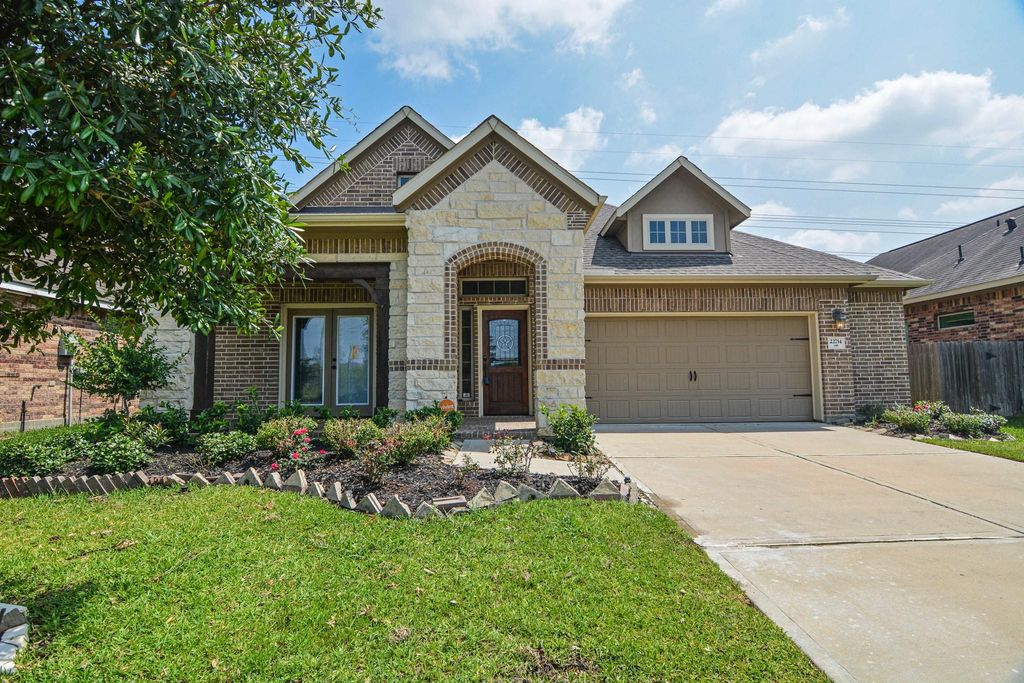 22714 Little Blue Stem Drive, Tomball, TX 77375