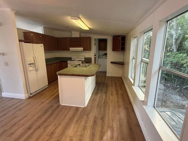 12002 Sandalfoot Boulevard W, Boca Raton, FL 33428