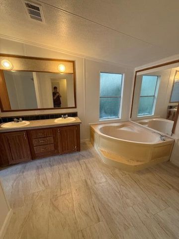 12002 Sandalfoot Boulevard W, Boca Raton, FL 33428