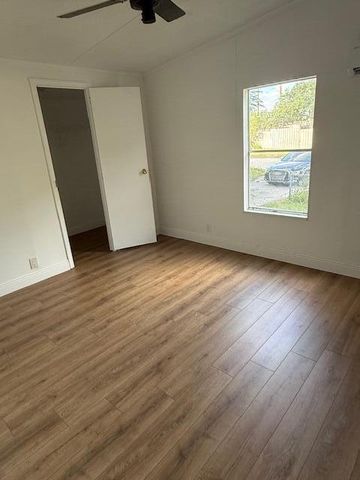 12002 Sandalfoot Boulevard W, Boca Raton, FL 33428