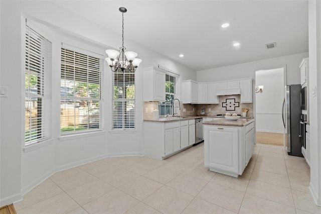 52 W Twinberry Place, The Woodlands, TX 77381