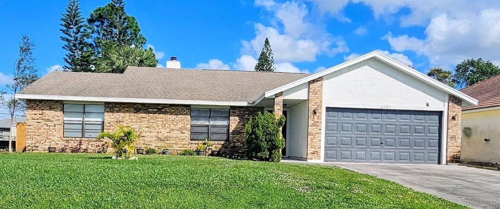 1137 SW Estaugh Avenue, Port St Lucie, FL 34953