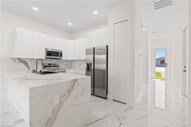 428 Petite AVE, Lehigh Acres, FL 33974