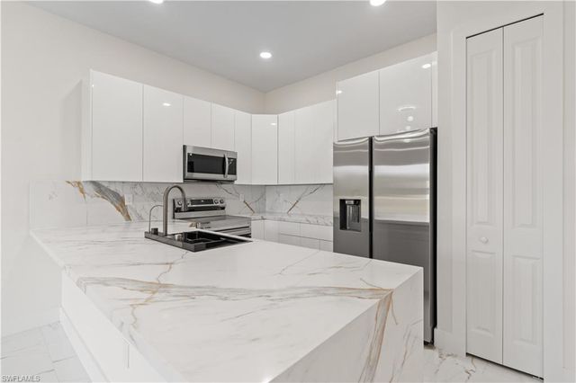 428 Petite AVE, Lehigh Acres, FL 33974