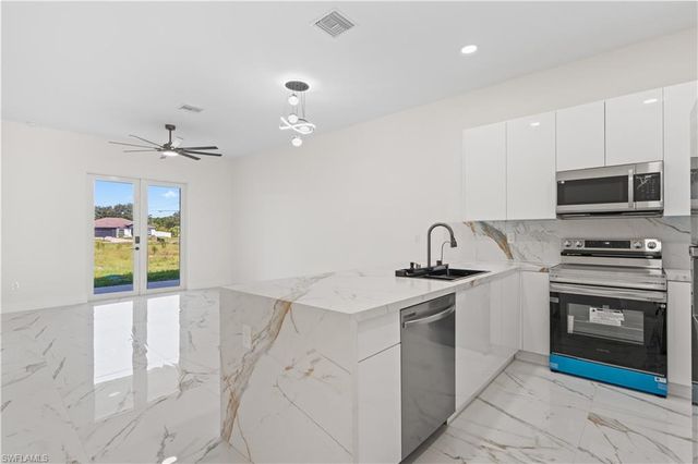 428 Petite AVE, Lehigh Acres, FL 33974