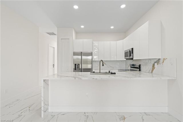 428 Petite AVE, Lehigh Acres, FL 33974